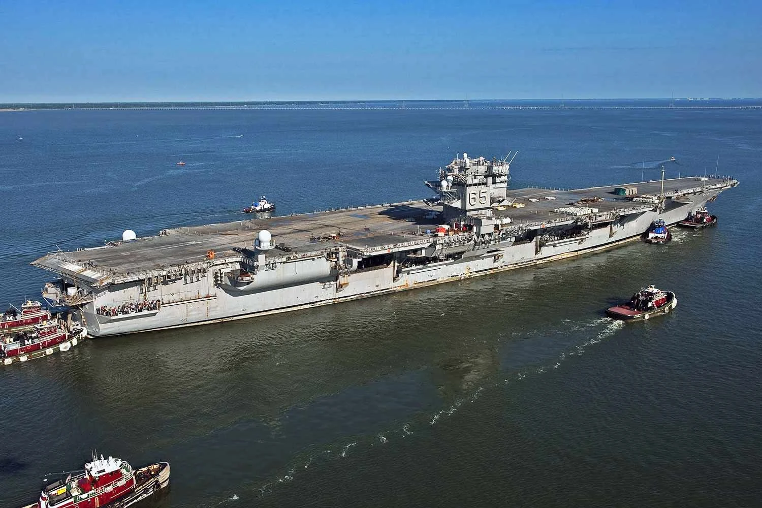 The hull of the former USS Enterprise being towed to Newport News (US Navy)