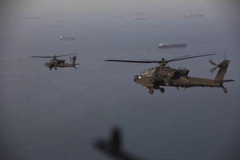 US Army Apaches fly armed patrols over Strait of Hormuz as tensions persist