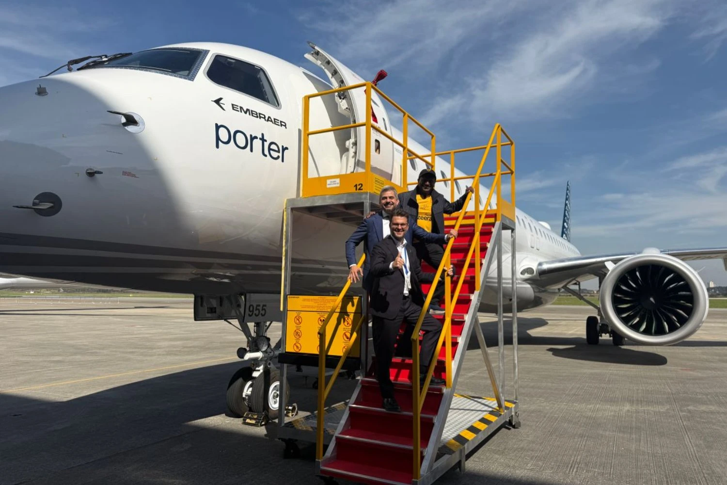 Jazeera Airways CEO Barathan Pasupathi in front of a Porter Airlines E195-E2