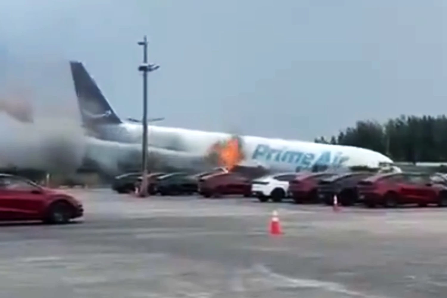 The Amazon Boeing 767 cargo plane came to a stop in a ditch after crossing a highway and striking vehicles | SOCIAL MEDIA