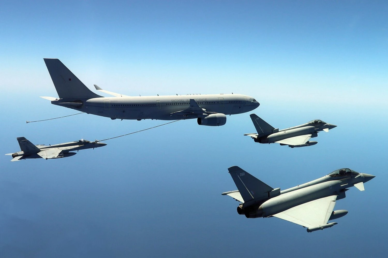 A Royal Air Force Voyager KC3 refueling a U.S. Navy F/A-18 | U.S. NAVY