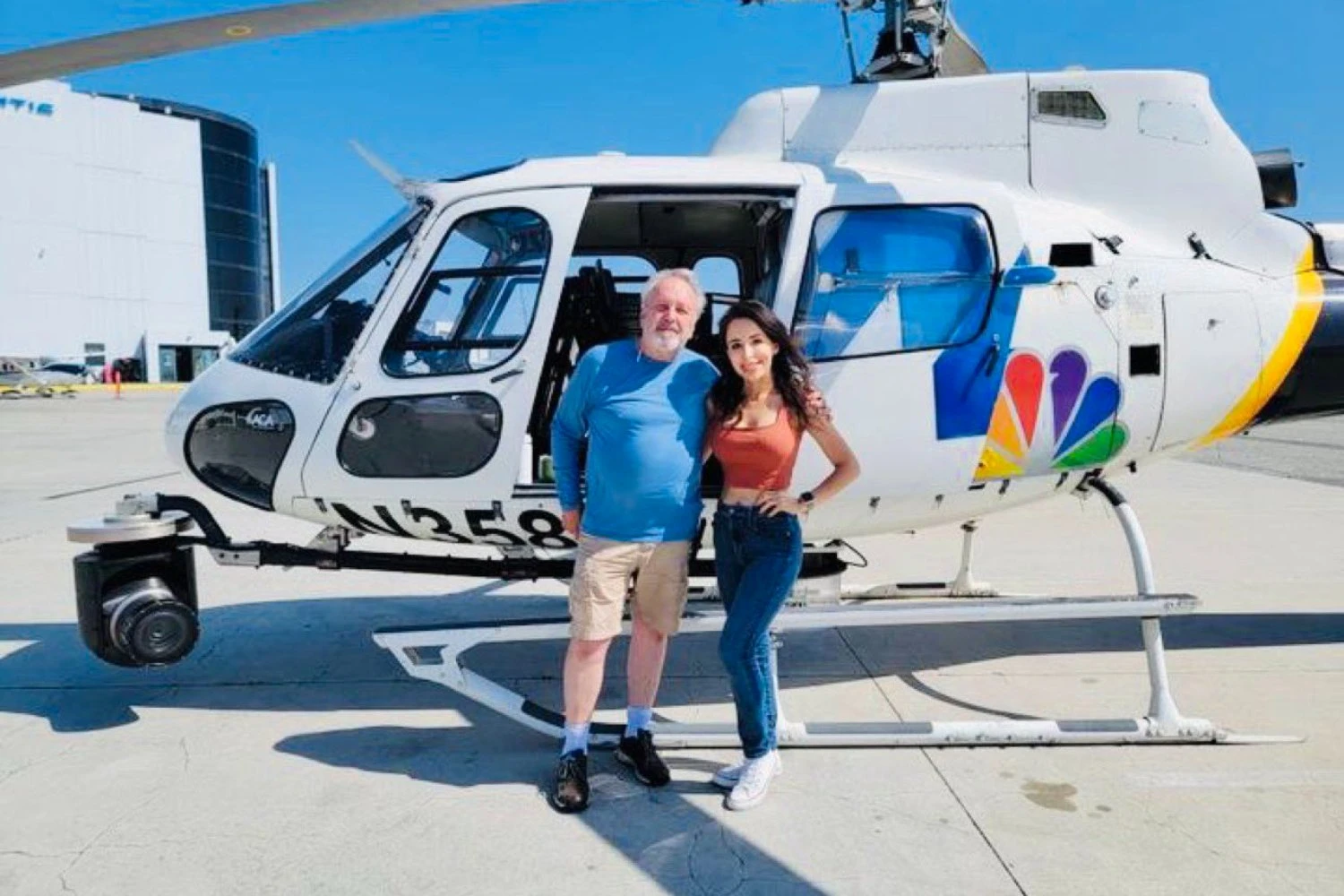 Pilot George Marciniw and aerial photojournalist Eliana Moreno