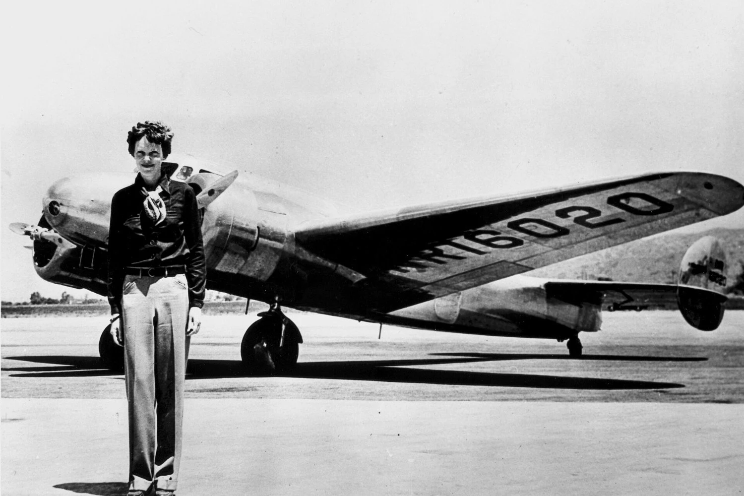 Amelia Earhart standing in front of the Lockheed Electra in which she disappeared in July 1937 | SMITHSONIAN INSTITUTION