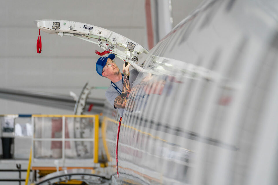 Worker on A220 assembly (Airbus)