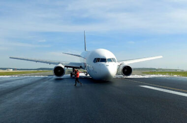 The FedEx Boeing 767F with the front landing gear retracted on the runway at Istanbul Airport